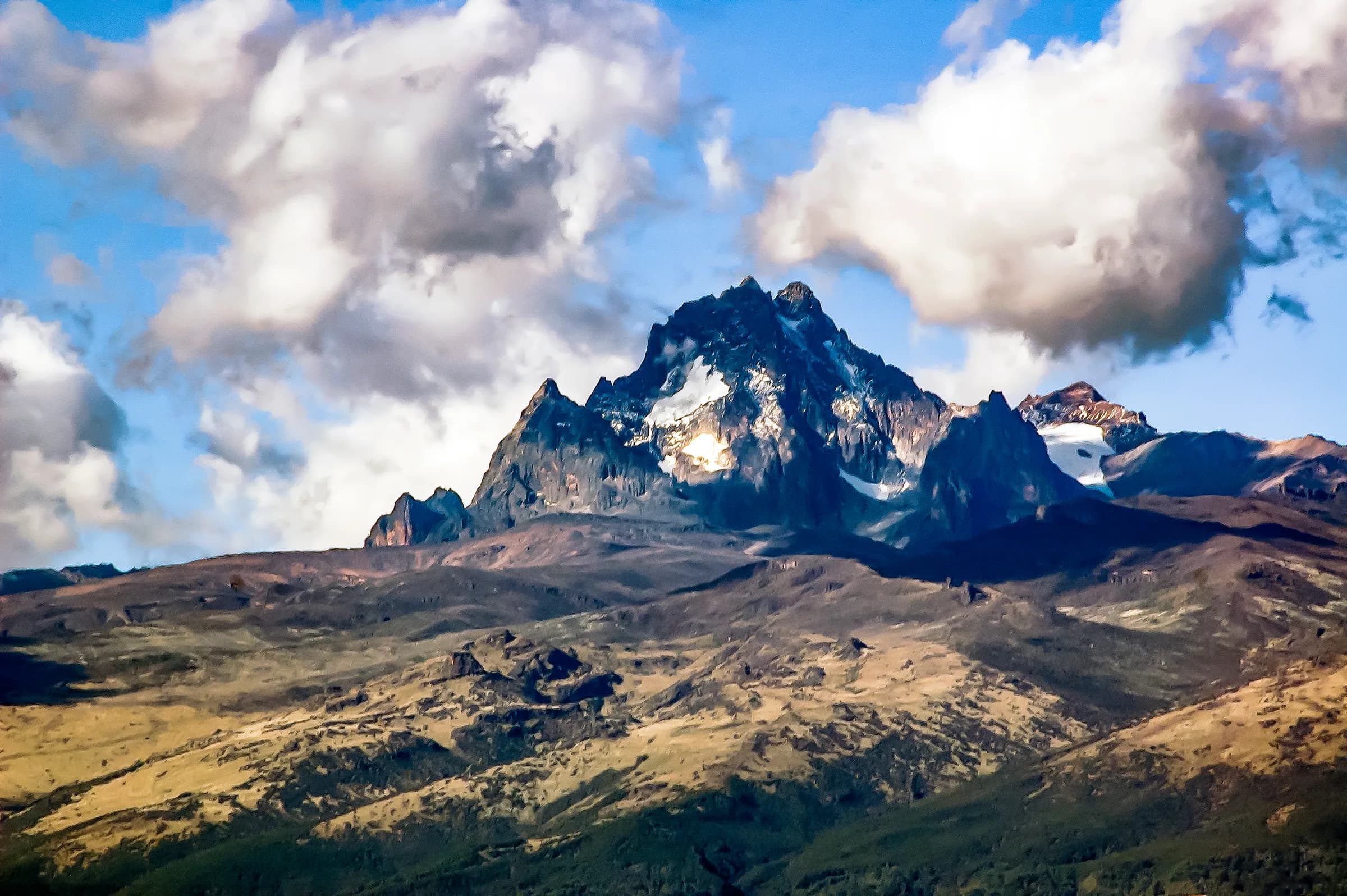 The three peaks of Mount Kenya rising above the plains