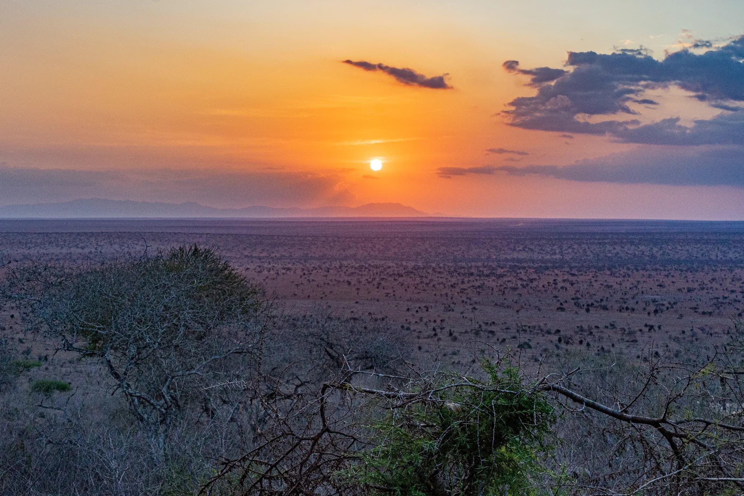 Fiery sunset over the vast wilderness of Tsavo West